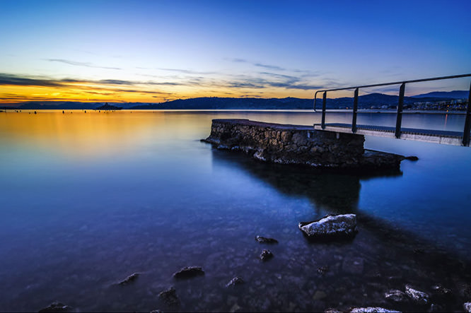 Sunset on a sea like a millpond in Cap d'Antibes French Riviera
