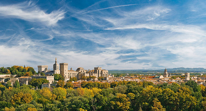 Wide panoramic view of old town and Papal palace in Avignon