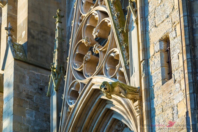 Facade of St Nazaire church with gargoyle