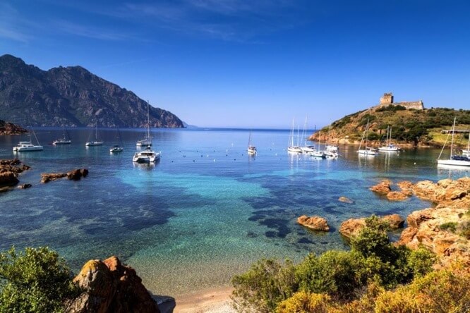 Elevated view of yachts anchored in bay, Girolata, Corsica