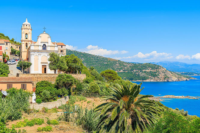 Typical church on coast of Corsica island in Cargese village