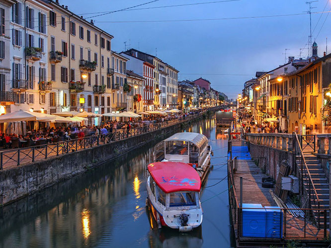 Evening scene along the Naviglio Grande canal in Milan