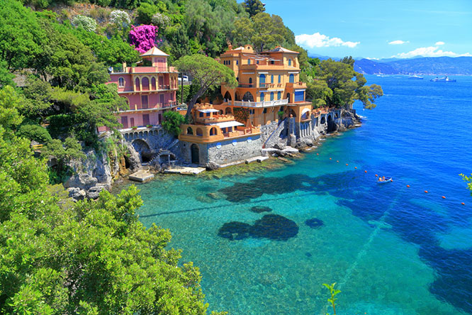 Green sea floor near sunny villas of Portofino