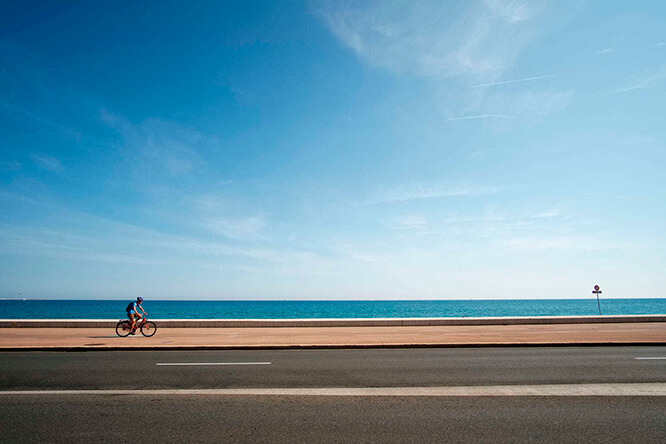 A bicycle rider on the seaside of Cagnes sur Mer