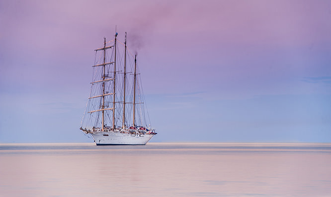Old boat at sunrise in Cannes