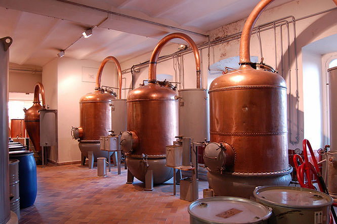 Ancient distiller for the production of perfume in Fragonard factory French Riviera