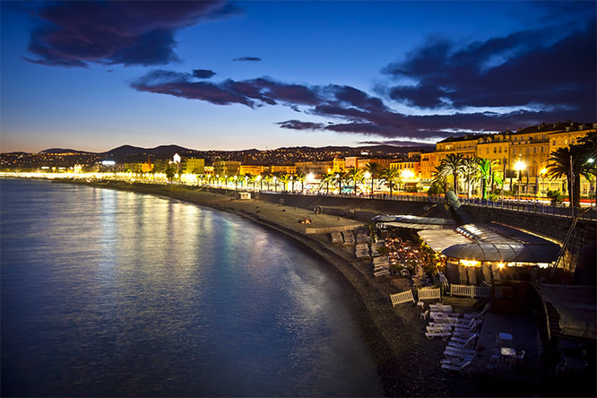 The beach and the waterfront of Nice at night
