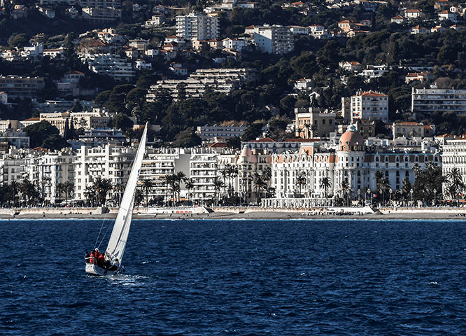 A boat sailing towards Nice French Riviera