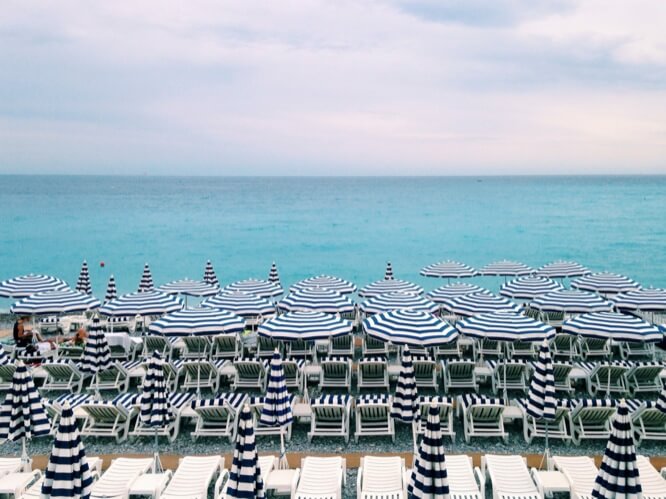 Deck chairs and parasols on Nice's beach 