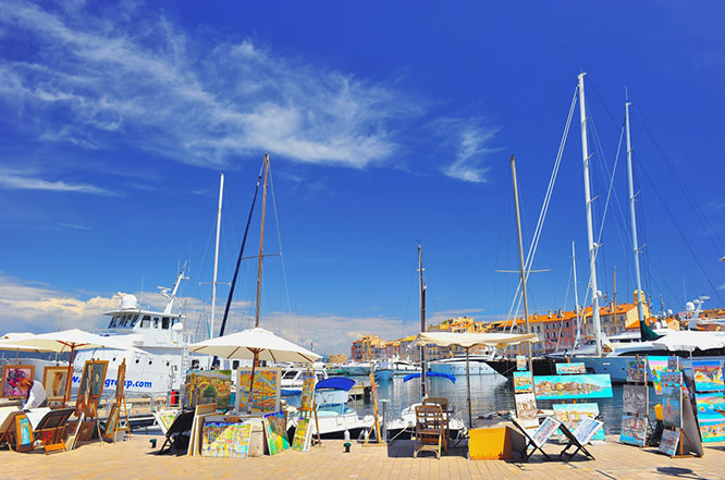 Artists on the port of St Tropez French Riviera