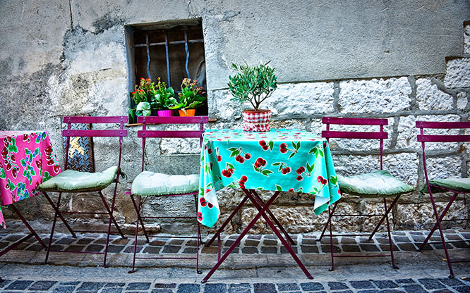 Chairs and table in a street